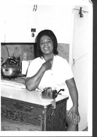 img-black_lady_near_stove.jpg